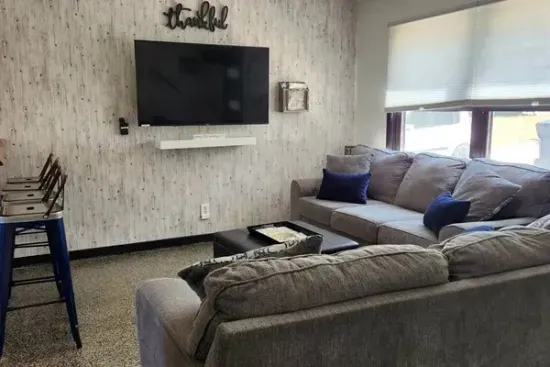 Holy Cow Main Floor Living Area | Smart TV | Breakfast Bar Area