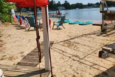 Slice-of-Heaven TC | Spa Retreat | Silver Lake CottageHot Tub | Barrel Sauna Full Window Lake Views | Cold Plunge Barrel Private sandy beach peninsula frontage packed with fun, canoe, rowboat, kayaks.