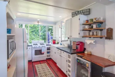 Slice-of-Heaven TC | Spa Retreat Vintage Kitchen Look - Modern Gas Stove-Oven, Microwave, Fridge Freezer Combo, Beverage Cooler, Keurig full pot single cup combo. Bring your own grounds, we provide filters and k-cups to get you started.