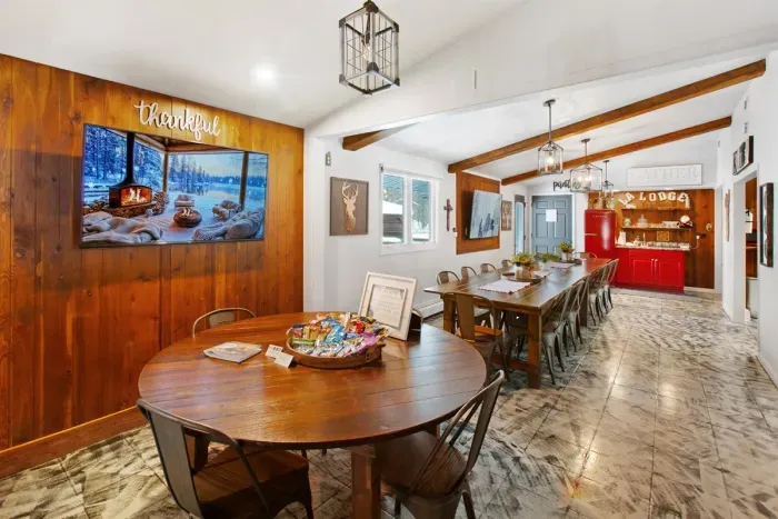 LA Lodge Great Hall a seat for everyone at the table. Live Edge Bar Seating Dining Room