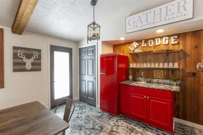 LA Lodge wet bar steps to the backyard deck .