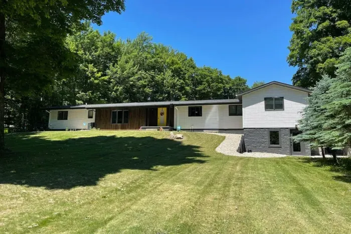 Front Yard view with Lower Level LA Lodge Pub Room entrance. Wheelchair accessible , with two entry doors.