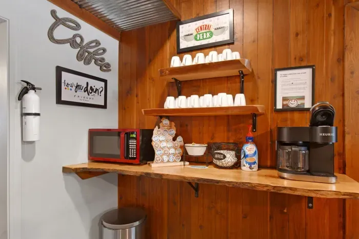 Coffee Bar with pocket door kitchen storage.
