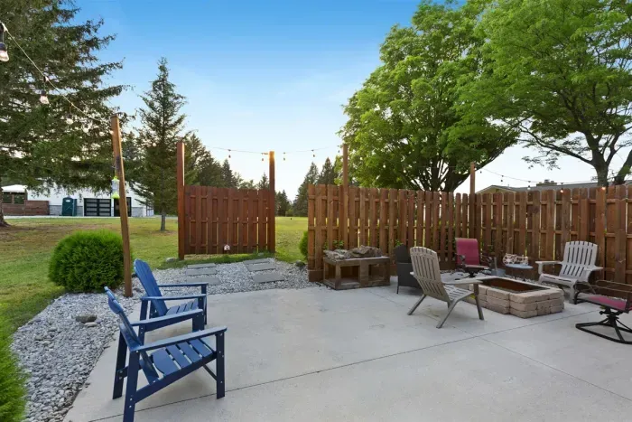 Tiny House private courtyard with patio, firepit and barbeque grill.