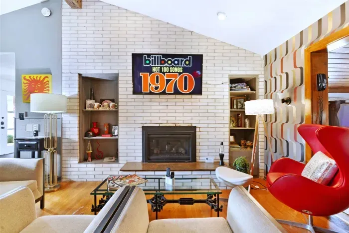 Whiskey Bar Lounge | Main Floor, adjacent to Living Room and the Grand Recreation Room | Gas Fireplace | Hot Tub Views