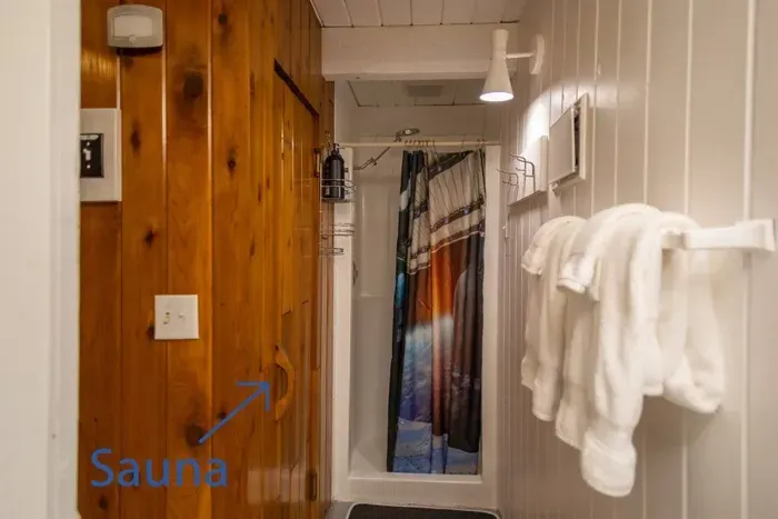 Lower Level at Base of Stairs to Grand Game Room | Single Shower Bathroom | Adjacent to Sauna and Mission Impossible Bedroom 