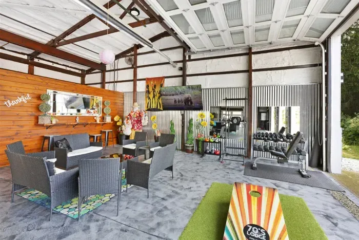 70's Lodge Pool House | Lounge Area | Changing Room | Work-out Equipment | Arcade Games | Indoor- Outdoor Smart TV's | Disco Lights | Radiant Heat | Dry Bar & Bar Stools | Refrigerator | Corn