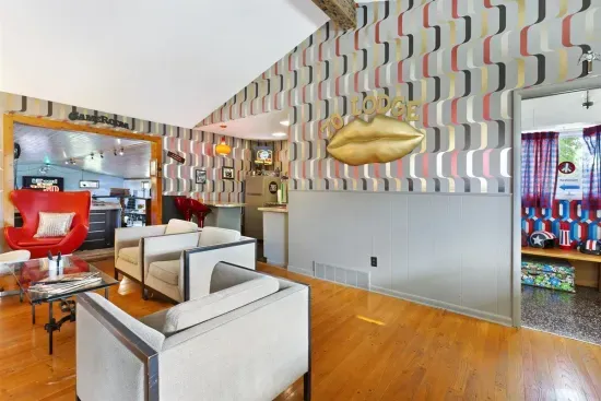 Whiskey Bar Lounge | Main Floor, adjacent to Living Room and the Grand Recreation Room | Gas Fireplace | Hot Tub Views