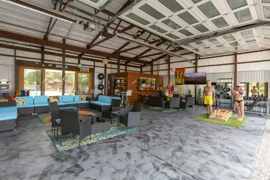 70's Lodge Pool House | Lounge Area | Changing Room | Work-out Equipment | Arcade Games | Indoor- Outdoor Smart TV's | Disco Lights | Radiant Heat | Dry Bar & Bar Stools | Refrigerator | Corn