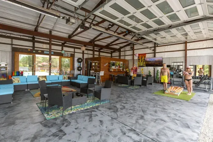 70's Lodge Pool House | Lounge Area | Changing Room | Work-out Equipment | Arcade Games | Indoor- Outdoor Smart TV's | Disco Lights | Radiant Heat | Dry Bar & Bar Stools | Refrigerator | Corn