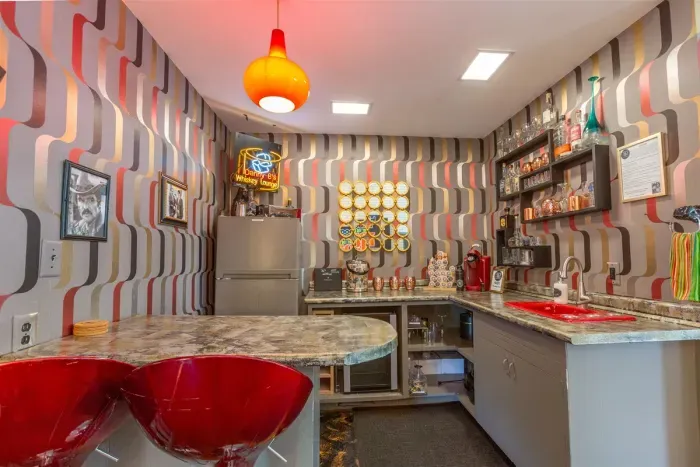 Whiskey Bar Lounge | Main Floor, adjacent to Living Room and the Grand Recreation Room