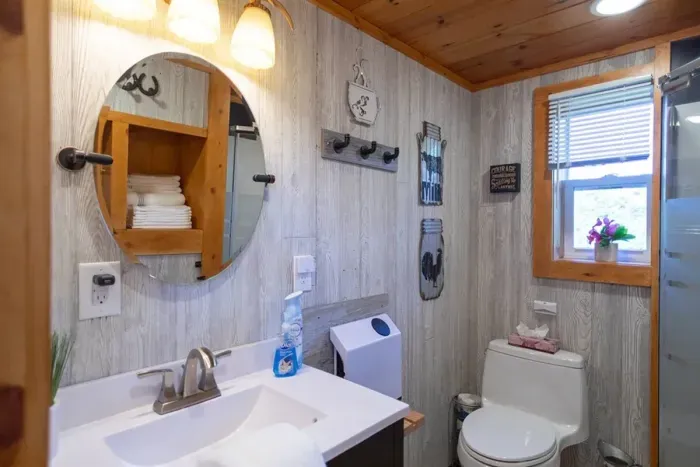 Tiny Ranch House private bathroom with standup shower.