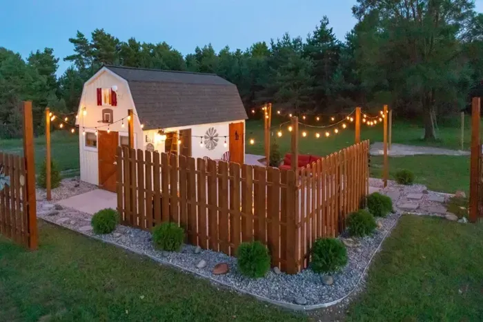 Tiny Ranch sits about 100 yards from the main house with a rustic, western cowboy theme.