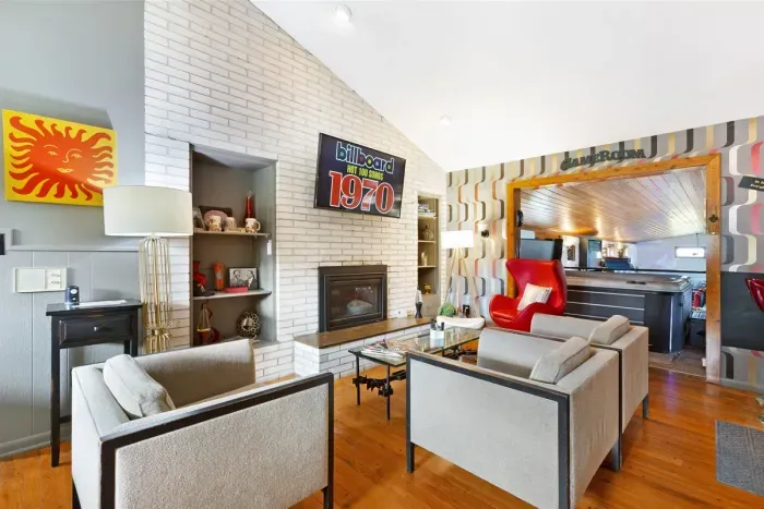 Whiskey Bar Lounge | Main Floor, adjacent to Living Room and the Grand Recreation Room | Gas Fireplace | Hot Tub Views