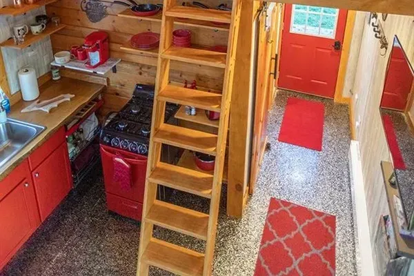 Spacious Queen bed nestled in the loft.