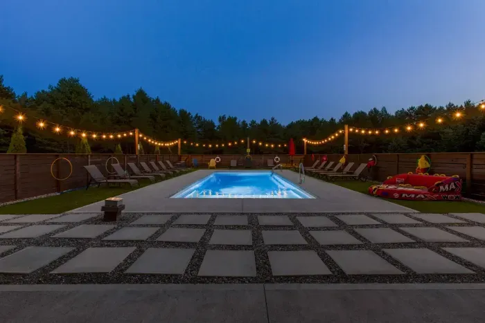 70's Lodge Pool House | Lounge Area | Changing Room | Work-out Equipment | Arcade Games | Indoor- Outdoor Smart TV's | Disco Lights | Radiant Heat | Dry Bar & Bar Stools | Refrigerator | Corn