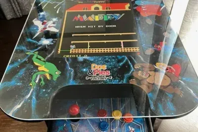 Traverse City Bungalow Spa Retreat | Adventure North Vacation Rentals | Video Arcade Fun - includes the your fan favorites, Ms. Pac-man & more!