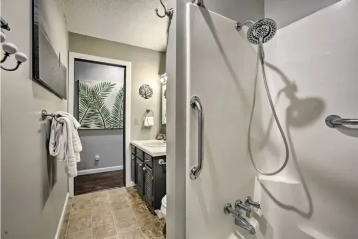 Traverse City Bungalow Spa Retreat | Full Bath Tub Shower Combo | Adventure North Vacation Rentals | Wake up with a morning shower!