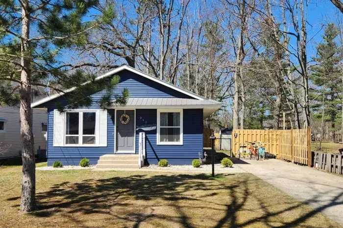 Traverse City Bungalow Spa Retreat | 2BR | 2BA | Sleeps 4 | Pet Friendly with added Fee | Adventure North Vacation Rentals | Complimentary use of bikes, must sign liability waiver to use bikes.
