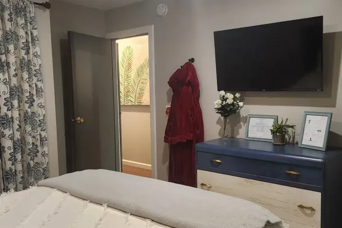 Traverse City Bungalow Spa Retreat | King Master Bedroom | Adventure North Vacation Rentals | Watch a movie from the comfort of bed!