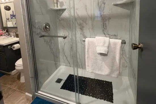 Traverse City Bungalow Spa Retreat | Full Bath Tub Shower Combo | Adventure North Vacation Rentals | Wake up with a morning shower!