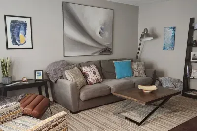 Feel at home relaxing in this house's inviting living room. Enjoy a great book in the reclining chair.