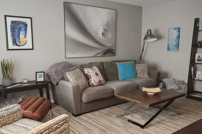 Feel at home relaxing in this house's inviting living room. Enjoy a great book in the reclining chair.