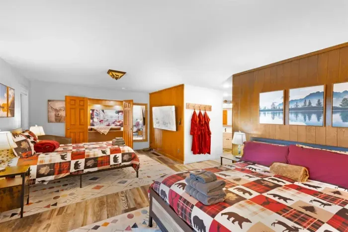 Master Suite | 1 King 1 Queen Beds | Jacuzzi Tub | Steam Shower |  Walk-in Closet Storing Roll-away Twin Beds