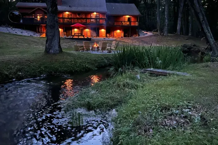 Hall Creek Lodge Large Group Spa Retreat | Adventure North Vacation Rentals | Serene Summer Night