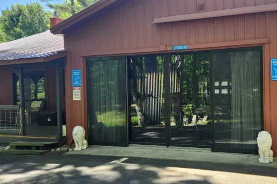 Hall Creek Lodge | Adventure North Vacation Rentals | Guest House Restore the Roar Recreation Room | Pool Table | Ping Pong | Arcade Games | Darts | Smart TV's | Work-out Area | High-top Table