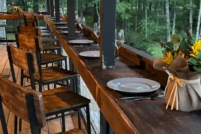 Hall Creek Lodge | Creekside Outside Covered Porch Dining