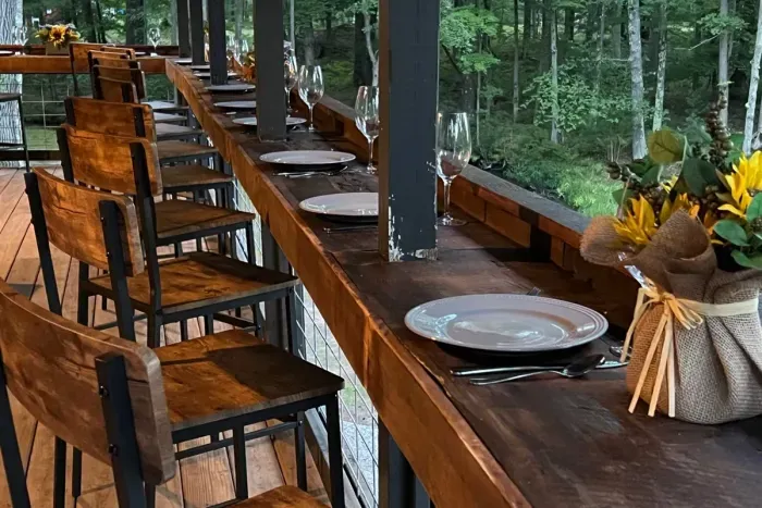 Hall Creek Lodge | Creekside Outside Covered Porch Dining