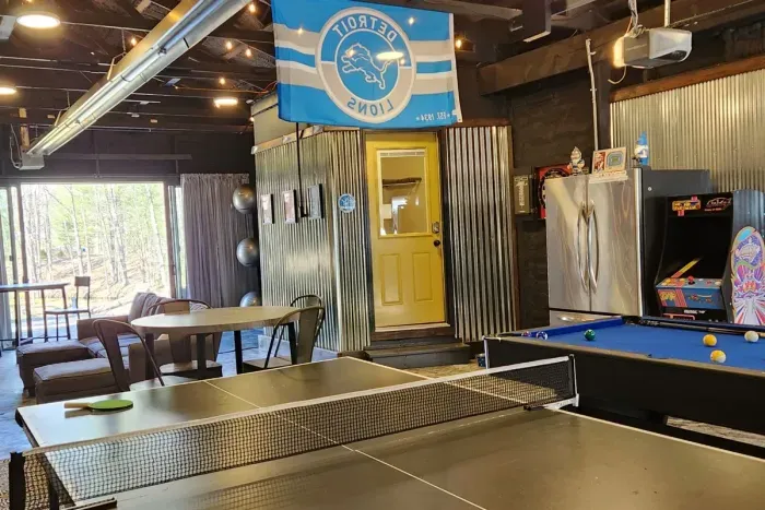 Hall Creek Lodge Large Group Spa Retreat | Adventure North Vacation Rentals | Guest House Restore the Roar Recreation Room | Pool Table | Ping Pong | Arcade Games | Darts | Extra Refrigerator