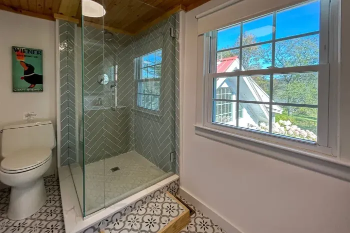 Bathroom 1 has been newly remodeled and is part of the primary bedroom suite on the second floor