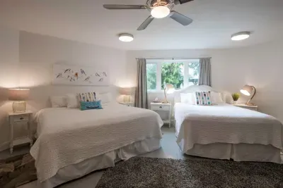 The first floor bedroom on the main floor with king and a queen bed.