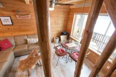 The living and dining room areas from the stairs.