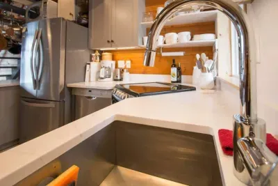 Deep sink with quartz counter gives a luxury feel