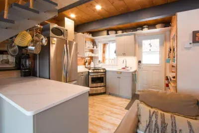 Step in the door to the newly renovated kitchen with fridge, stove and dishwasher. Lots of counter space too!