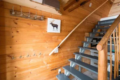 Up the stairs to the two bedroom areas.