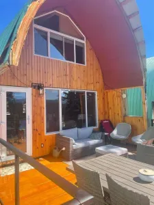 Everly's Hideout perched on the hill overlooking Idabel Lake. This cottage is an all year round getaway, only 20 minute drive to Kelowna and Big White.