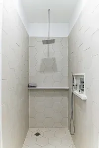 Spacious shower with rain head, 3.5 x 5 feet
