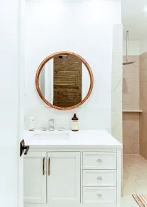 New ensuite bathroom with vanity, large shower, and toilet.