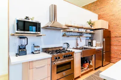 Prepare your meals in the fully equipped kitchen with natural gas stove, fridge, dishwasher. There is also a toaster, kettle, Cuisinart coffee maker and microwave.