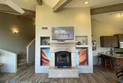 [Living Room] Relax and stream your favorite shows fireside with the home's gas fireplace.