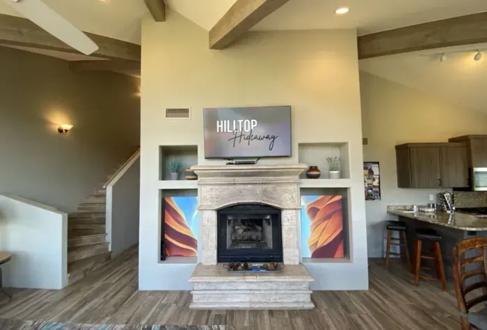 [Living Room] Relax and stream your favorite shows fireside with the home's gas fireplace.