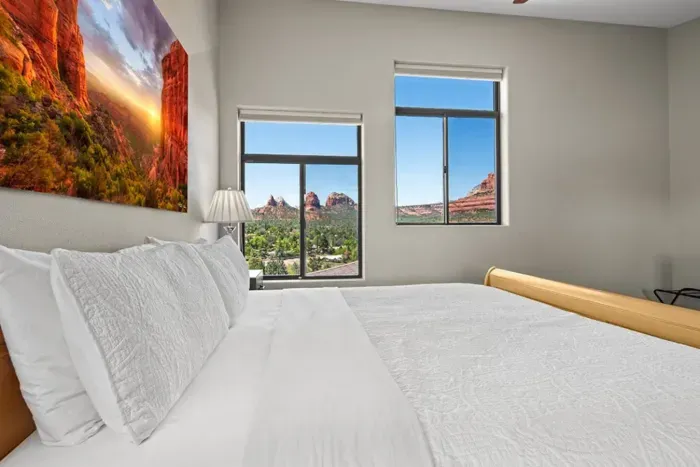 [Bedroom 1] Wake up to iconic red rock scenery right from the comfort of your king bed.