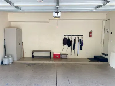 [Garage] Park securely in the spacious garage. Driveway and street parking are also available.