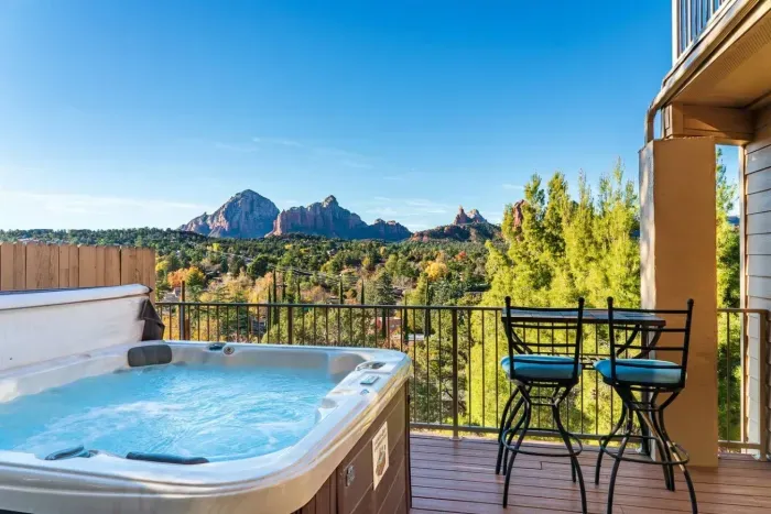 [Hot Tub] Unwind in the 6-person hot tub after hiking, surrounded by iconic red rock scenery.