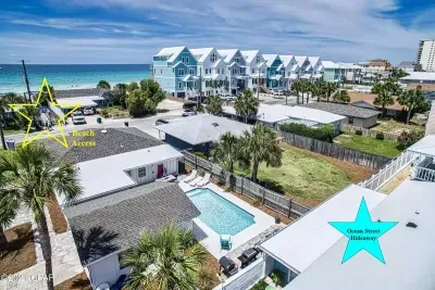 Just 60 steps to beach access! From the front driveway, walk on level ground past one neighboring house and across one local, residential street. Public beach access is ramped; no steps!