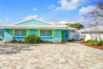 Unloading your groceries and beach gear is a breeze with such convenient parking. There are two outdoor showers to keep the sand outside; one shower is just to the left of the home, and the other is located on the backyard patio.